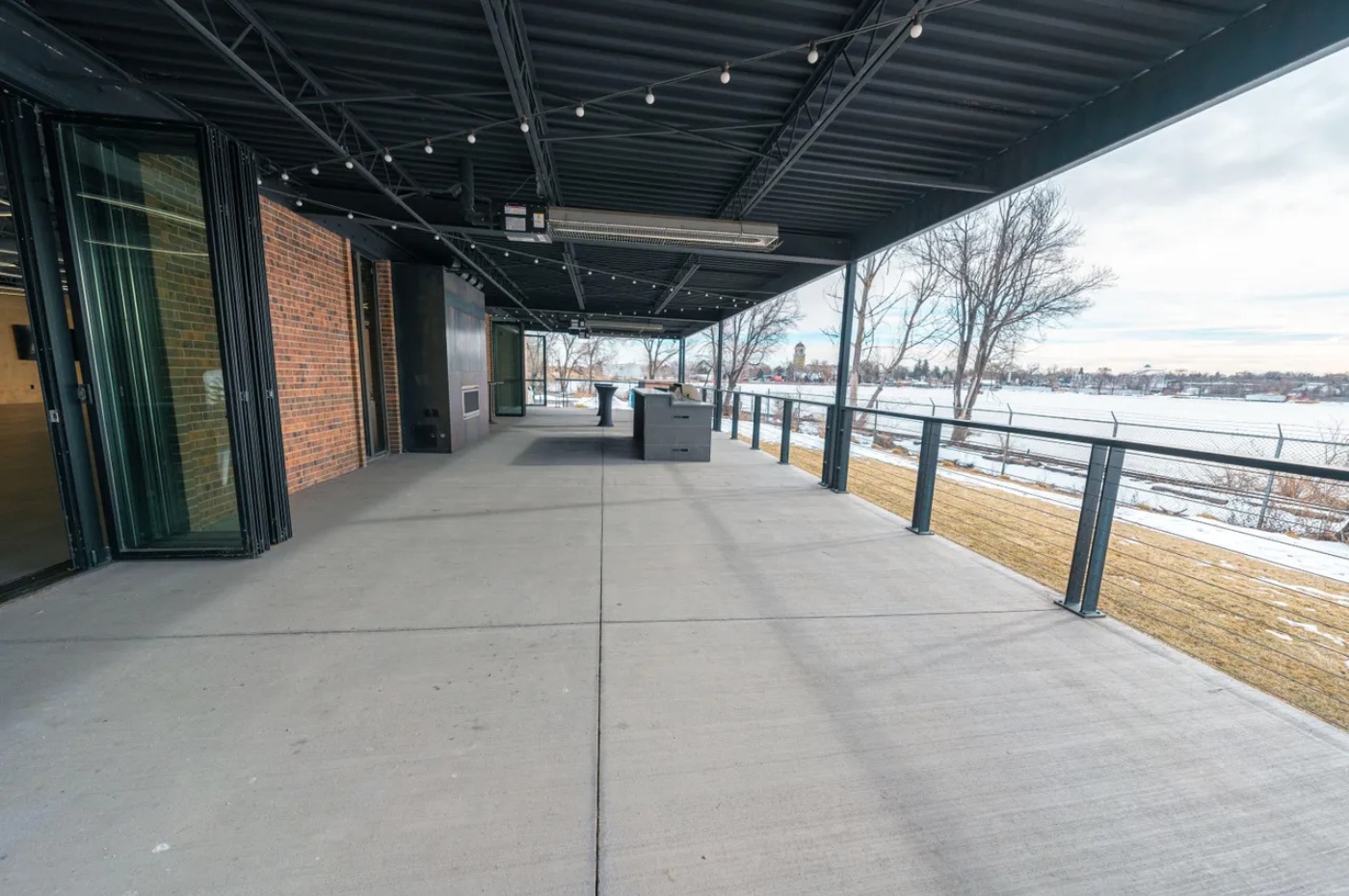 Outdoor patio of event space overlooking a lake